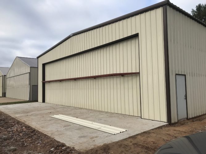 prefabricated steel aircraft hangar plans and storage options on a budget
